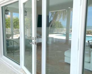 $600 Double door (2 sets), impact glass. High quality, no rust, like new. 71.5”W x 78”H