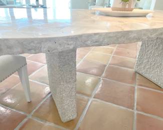 $3,200 Designer Palecek dining table, seats 6. (New, this table likely sold for $10,000+) This is from the Camilla Collection and features fossilized clam shale top with a natural edge, and a chiseled “stone” base.