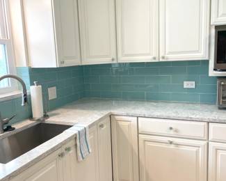 $600 OBO Kitchen cabinets – uppers and lowers -- are a combination of old cases and new doors with pretty, blue sea glass cabinet pulls. Upper set includes (2) single (right and left), (1) corner cabinet, (1) over microwave set, (1) over kitchen set. Measurements available upon request.