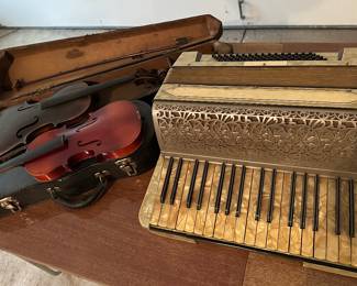 Antique instruments: accordion, violin