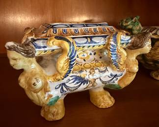 An 18th century Italian faience salt cellar in the form of winged creatures ,