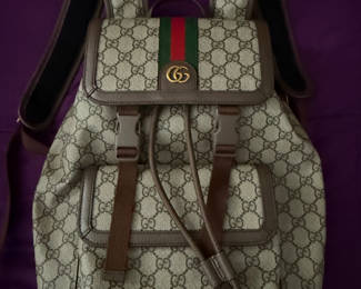 NEW GUCCI BACKPACK with orginal receipt 