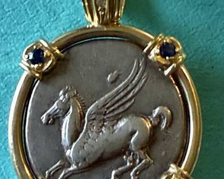 Ancient Pegasus coin with sapphires in 18k