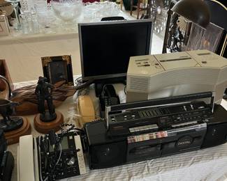 Vintage touch tone phones, Bose Acoustic Wave Stereo Music System CD-2000, Vintage Goldstar Compact Disc/Radio Cassette Recorder Radio , Sharp TV