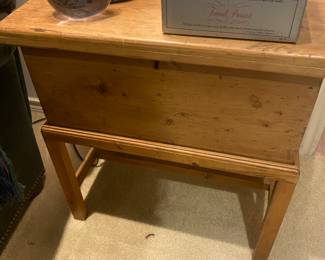 Little pine box atop a little pine table