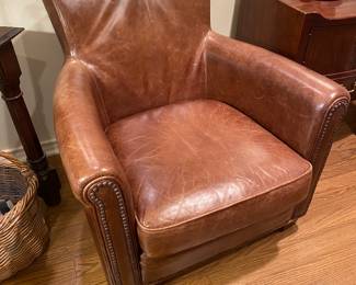 Leather Pottery Barn chair. I believe this is the Irving Roll chair.