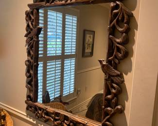 Carved wood mirror