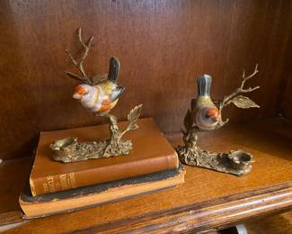 Porcelain birds on bronze