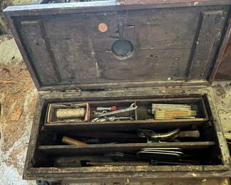 Tool box is dated 1880, full of various vintage tools