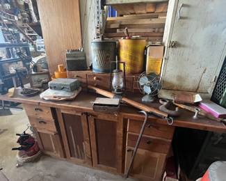 Random vintage and modern trinkets scattered about - tools filled below