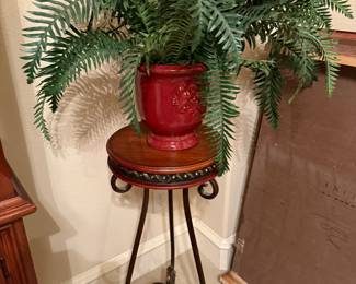 Two round pedestal tables