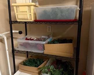 More metal wire shelving with Christmas garland