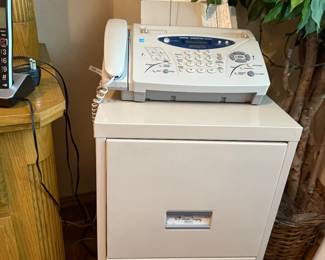 Metal file cabinet and fax machine