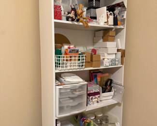 Second white Shelving unit. Book shelves