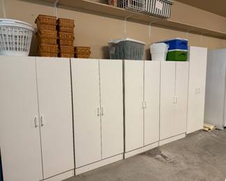 Many garage storage cabinets.