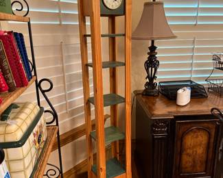 Tall shelf with clock
