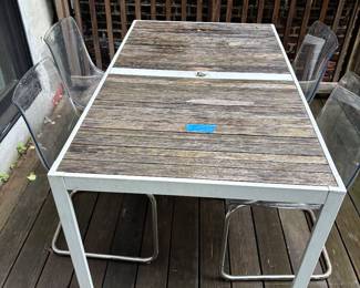 Patio Table With Four Chairs, Umbrella And Stand.
$50
