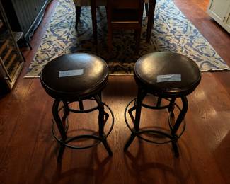A Pair Of Leather Seat Stools, Metal Base. Spinning Height Adjustment.
$50 For The Pair.