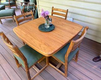 Oak table and six chairs.