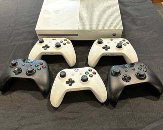xbox console and controllers 