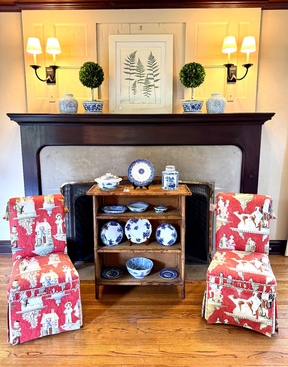 ($80; framed fern print with water damage that gives it a good patina)(SOLD; French country custom-upholstered slip covered chair; 19x21x36) (SOLD; vintage rattan display shelf: 35x13x48) Shop this beautiful collection of vintage and antique blue and white china in person. (SOLD; decorative blue and white ginger jars) (SOLD; boxwood topiary with ceramic blue and white pot; 21"h)