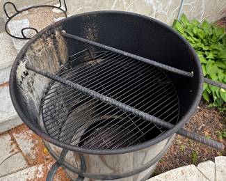 $240; Pit Barrel brand 18.5" base smoker with cover; 25x29; close up of the interior