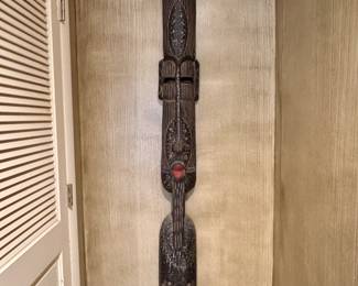 $450; hand-carved, wooden tribal mask; 8"dx71"h