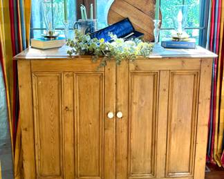 $700; English Colonial hand-crafted, paneled pine, 2-door cupboard; 51x22x43