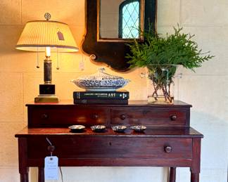 ($450; antique, 4-drawer secretary;34x17x34) ($160; vintage blue and white porcelain English tureen with lid) (SOLD; black and gold scrolled mirror; 20x39) (SOLD; brass and marble table lamp; 19"h)