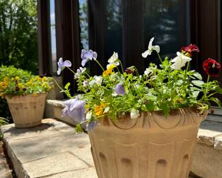 $38 each (2 available); resin flower pot with pansies