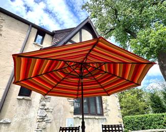$400; Treasure Island 11'd striped patio umbrella with Sunbrella fabric and stand. Chaise Lounges NFS
