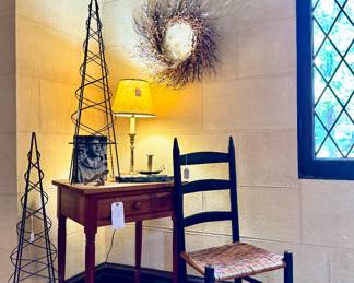 ($80; vintage pine one drawer table; 22x18x3) ($120; Shaker ladder back rattan chair) ($48 each-2available; metal garden vine trellis cones; 40"h) (SOLD; berry and twig wreath) ( SOLD; brass table lamp with marble base; 22"h)
