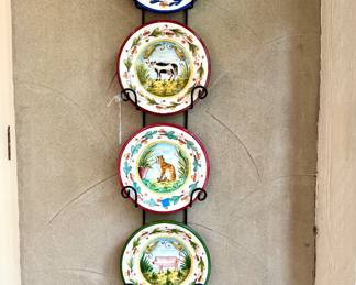 (SOLD; set of 4 hand painted farm animal plates) (SOLD; metal wall plate rack)