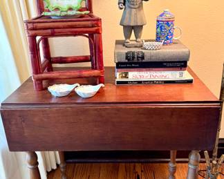 ($80; vintage, child-sized bamboo chair in red) ($30; vintage terracotta Chinese warrior; 16"h) ($18; Chinoiserie porcelain tea seeper and cup; 6"h) ($50 each-2 available; Richard Ginori Italian Green Cockerel scalloped dish) (SOLD; drop leaf table with side drawer; 18x30x29; extended size: 32x30x29)