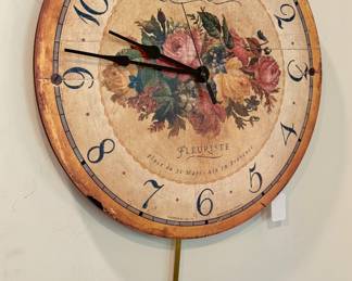 $48; Timeworks wall clock with pendulum and botanical design; 16"d