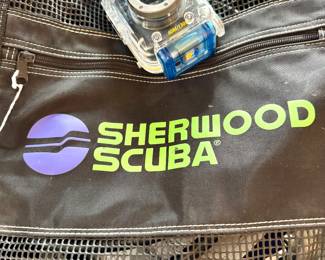 ($400; Sherwood Scuba regulator & gear) ($120; Canon WP-DC31 waterproof camera case)