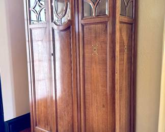 $2200; authentic antique Austrian Biedermeier heirloom linen cabinet that has been passed down for generations, with beveled glass, inlaid wood design and curved door; 44x18x67