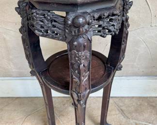 $600; marble plant stand with carved wood botanical details and clawfoot legs; 20"dx34"h