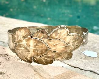 $32; artisan-made metal leaf belt