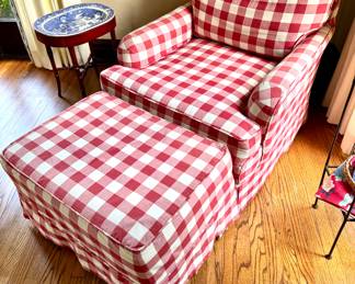 $450; slip-covered, red and white buffalo gingham chair and ottoman