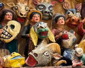 $400; vintage, hand-carved, hand-painted Peruvian altarpiece, signed by artist Nicario Jimenez Quispe; priest tool to teach of sainthood; 9x4x17; closeup of interior craftsmanship