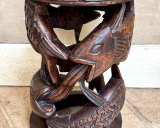 $250; carved wooden fish table; 11"dx17"h