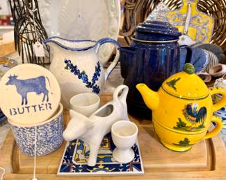 ($100; Sponge Wear butter dish) ($20; hand painted blueberry pitcher) ($28; enamel ware blue coffee pot) ($28; hand painted, made in Italy teapot with cup) ($12; cow creamer)