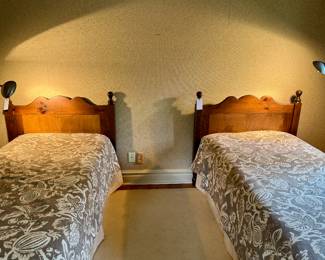 ($200 each-2 available; twin-sized, scalloped wooden headboard, bed frame. Box spring and mattress included) ($200 each-2 available; twin-sized, custom-made, designer, lined coverlet and bedskirt)