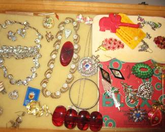 Some of the jewelry including bakelite, celluloid, rhinestones, Woodland Park Zoo elephant key