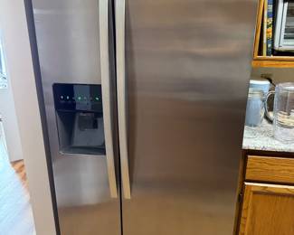 Kenmore side by side with water and ice on the door