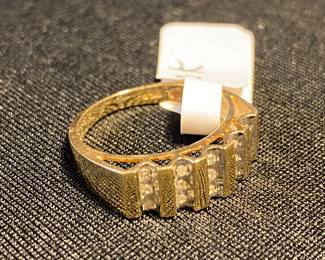 10k ring with diamonds.