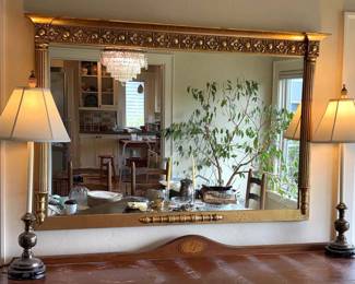 Ornately Framed Mirror With Two Buffet Lamps