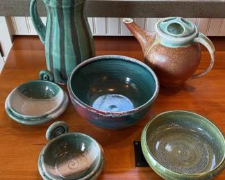 Hand Built Pottery Pieces In Green