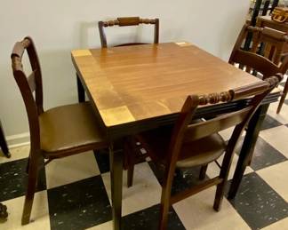 Very nice, sturdy card table with 4 wooden folding chairs.